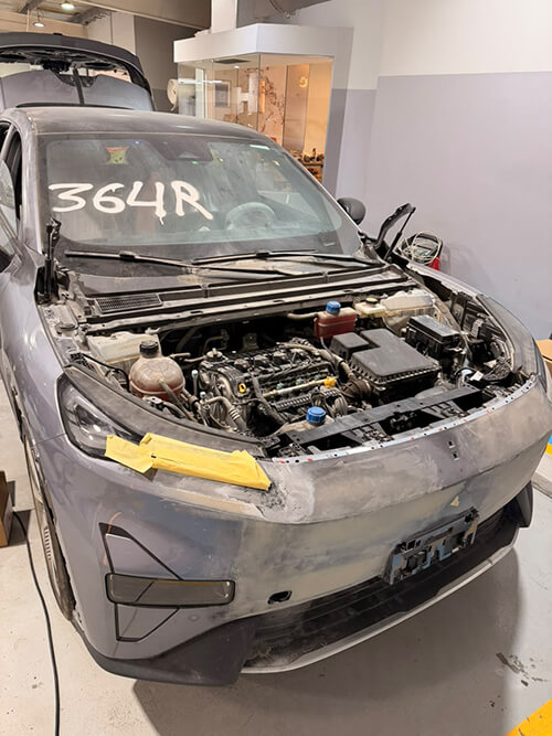 Accident-Damaged Luxury Car Repair front